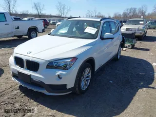 2015 BMW X1 xDrive28i with VIN WBAVL1C57FVY32440, listed as a IAAI auction lot 41739575 with 108,556 mi miles. Bid and sale history available at carsss.com. Image 17.