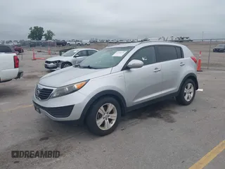 2012 Kia Sportage LX with VIN KNDPBCA24C7214432, listed as a IAAI auction lot 42530116 with 127,623 mi miles and . Bid and sale history available at DreamBid. Image 2.