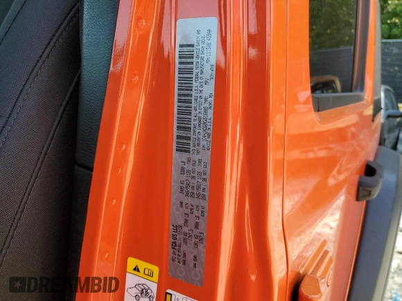 2019 Jeep Wrangler Unlimited Sport S with VIN 1C4HJXDG2KW516005, listed as a Copart auction lot 57330645 with 59,706 mi miles and Salvage title. Bid and sale history available at DreamBid. Image 13.
