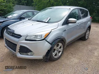 2014 Ford Escape SE with VIN 1FMCU9GX9EUB15619, listed as a IAAI auction lot 42603542 with 188,454 mi miles and . Bid and sale history available at DreamBid. Image 2.