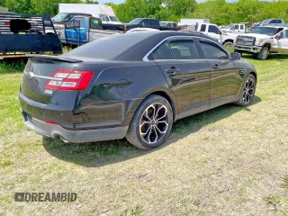 2013 Ford Taurus SHO z VIN 1FAHP2KT6DG144172, wystawiony jako Copart lot #63161585 z przebiegiem Nie podano mil oraz Czysty tytuł • Clean title. Historia ofert i sprzedaży dostępna na DreamBid. Obrazek 4.