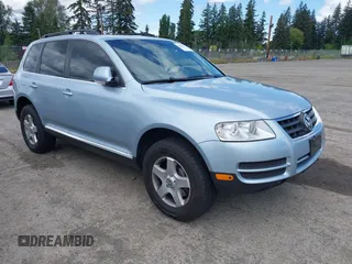 2007 Volkswagen Touareg V6 z VIN WVGZE77L37D001840, wystawiony jako IAAI lot #42323795 z przebiegiem 176 486 mil mil oraz . Historia ofert i sprzedaży dostępna na DreamBid. Obrazek 1.