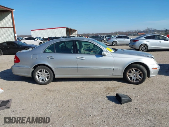 2006 Mercedes-Benz E-Class 3.5L with VIN WDBUF56J86A795135, listed as a IAAI auction lot 41286605 with 162,463 mi miles. Bid and sale history available at carsss.com. Image 13.