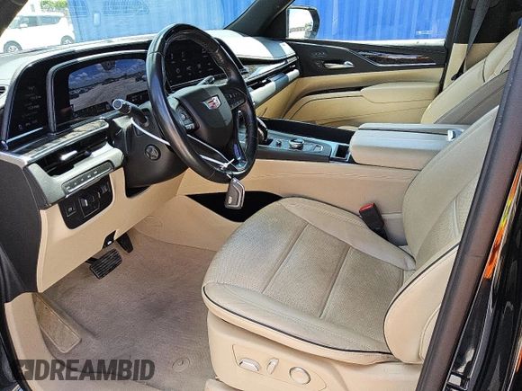 2023 Cadillac Escalade 4WD Premium Luxury with VIN 1GYS4BKL7PR332923, listed as a Copart auction lot 57442025 with 56,886 mi miles and Clean title. Bid and sale history available at DreamBid. Image 7.