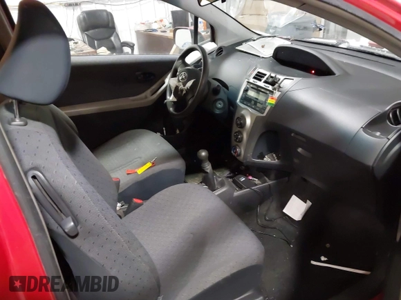 2009 Toyota Yaris with VIN JTDJT903695262292, listed as a IAAI auction lot 41636204 with 157,986 mi miles. Bid and sale history available at carsss.com. Image 5.