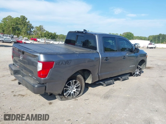 2023 Nissan Titan SV with VIN 1N6AA1EC6PN101712, listed as a IAAI auction lot 40206621 with 50,210 mi miles and . Bid and sale history available at DreamBid. Image 4.