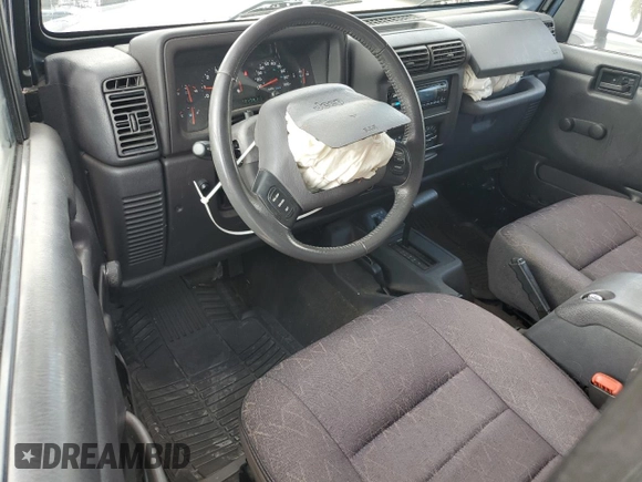 2002 Jeep Wrangler Sport with VIN 1J4FA49S72P722606, listed as a Copart auction lot 72525484 with 104,391 mi miles and Salvage Title. Bid and sale history available at carsss.com. Image 8.