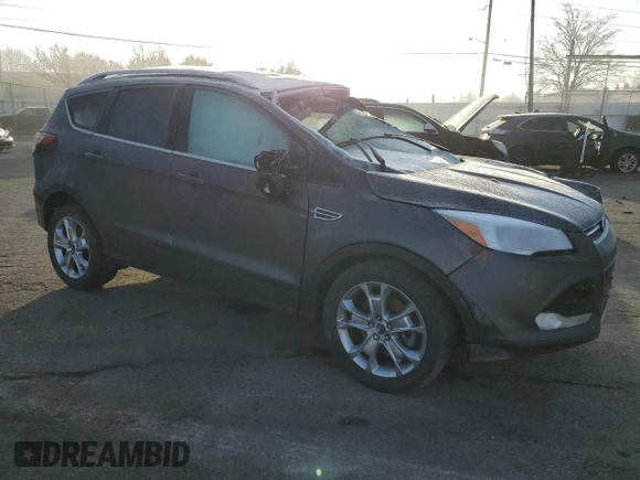 2015 Ford Escape Titanium with VIN 1FMCU0J99FUA26849, listed as a Copart auction lot 50583825 with Not provided miles and Salvage title. Bid and sale history available at DreamBid. Image 4.