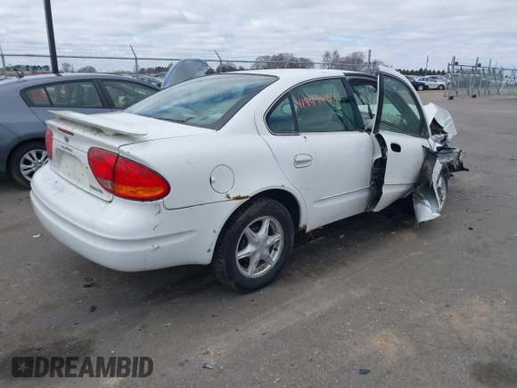2003 Oldsmobile Alero GL1 z VIN 1G3NL52E03C256239, wystawiony jako IAAI lot #41949463 z przebiegiem 319 725 mil mil oraz . Historia ofert i sprzedaży dostępna na DreamBid. Obrazek 4.