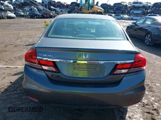 2013 Honda Civic LX z VIN 19XFB2F54DE041313, wystawiony jako IAAI lot #42414409 z przebiegiem 124 401 mil mil oraz . Historia ofert i sprzedaży dostępna na DreamBid. Obrazek 16.