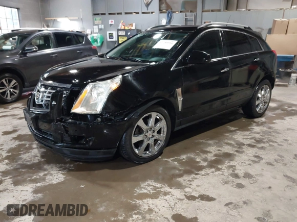 2012 Cadillac SRX Performance Collection z VIN 3GYFNEE37CS630391, wystawiony jako IAAI lot #42280516 z przebiegiem 137 330 mil mil oraz . Historia ofert i sprzedaży dostępna na DreamBid. Obrazek 2.