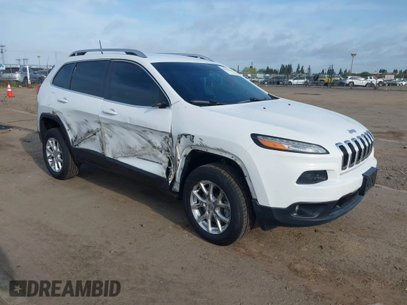 2016 Jeep Cherokee Latitude with VIN 1C4PJMCS1GW185442, listed as a IAAI auction lot 42033699 with 123,306 mi miles. Bid and sale history available at carsss.com. Image 1.