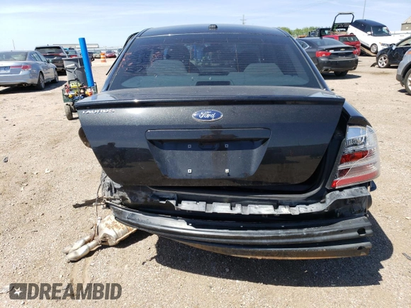 2009 Ford Taurus SE with VIN 1FAHP23W29G109225, listed as a Copart auction lot 58227024 with 0 mi miles and Salvage Title. Bid and sale history available at carsss.com. Image 6.