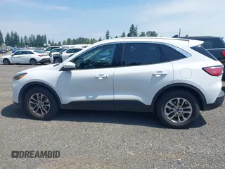 2020 Ford Escape SE with VIN 1FMCU9G67LUA79806, listed as a IAAI auction lot 42560963 with 103,070 mi miles and . Bid and sale history available at DreamBid. Image 14.