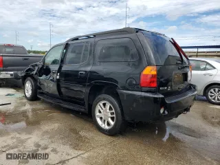 2006 GMC Envoy XL Denali with VIN 1GKES66M066115382, listed as a Copart auction lot 64031054 with 222,143 mi miles and Salvage Title. Bid and sale history available at carsss.com. Image 2.