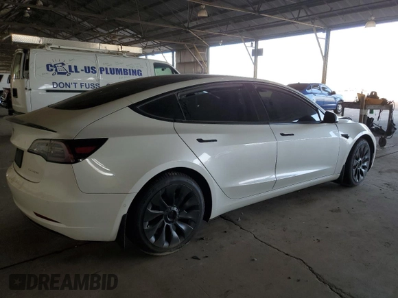 2021 Tesla Model 3 Long Range with VIN 5YJ3E1EB4MF938427, listed as a Copart auction lot 88270665 with 67,246 mi miles and Salvage Title. Bid and sale history available at carsss.com. Image 3.