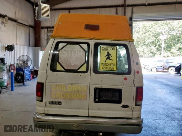2001 Ford Econoline Passenger XL with VIN 1FBSS31LX1HA03315, listed as a Copart auction lot 65772875 with 108,184 mi miles and Clean title. Bid and sale history available at DreamBid. Image 6.