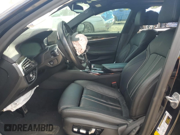 2020 BMW 5 Series M550i xDrive with VIN WBAJS7C03LCD00279, listed as a Copart auction lot 55698035 with 76,057 mi miles and Clean title. Bid and sale history available at DreamBid. Image 7.