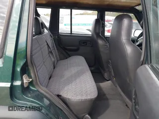 1999 Jeep Cherokee Sport with VIN 1J4FF68S1XL555463, listed as a IAAI auction lot 41898076 with 206,656 mi miles. Bid and sale history available at carsss.com. Image 8.