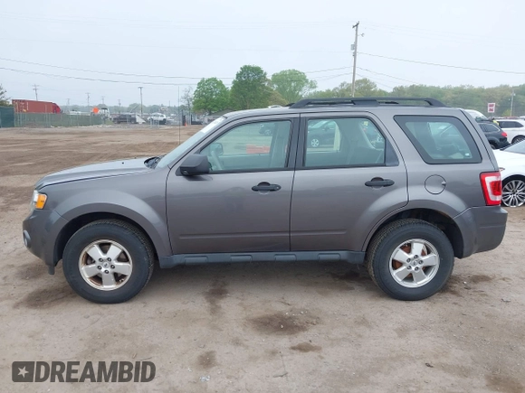 2012 Ford Escape XLS with VIN 1FMCU0C71CKC77027, listed as a IAAI auction lot 42236429 with 59,530 mi miles and . Bid and sale history available at DreamBid. Image 14.