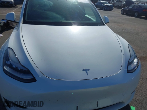 2020 Tesla Model Y Long Range z VIN 5YJYGDEE3LF043800, wystawiony jako IAAI lot #41590220 z przebiegiem 62 341 mil mil oraz . Historia ofert i sprzedaży dostępna na DreamBid. Obrazek 10.