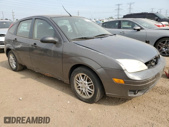 2005 Ford Focus S with VIN 3FAFP37NX5R134987, listed as a Copart auction lot 60478825 with 204,927 mi miles and Clean title. Bid and sale history available at DreamBid. Image 4.