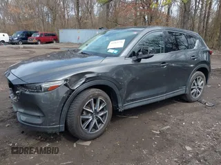2018 Mazda CX-5 Grand Touring with VIN JM3KFBDM6J0388540, listed as a IAAI auction lot 41963726 with 103,148 mi miles. Bid and sale history available at carsss.com. Image 18.