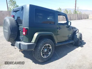 2007 Jeep Wrangler Sahara with VIN 1J4FA54147L184109, listed as a IAAI auction lot 42183722 with Not provided miles and . Bid and sale history available at DreamBid. Image 4.