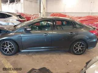 2016 Ford Focus SE with VIN 1FADP3F25GL308870, listed as a IAAI auction lot 41690326 with 103,136 mi miles. Bid and sale history available at carsss.com. Image 15.