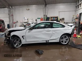 2015 BMW 4 Series 428i xDrive z VIN WBA3N9C52FK246245, wystawiony jako IAAI lot #41650714 z przebiegiem 142 776 mil mil oraz . Historia ofert i sprzedaży dostępna na DreamBid. Obrazek 15.