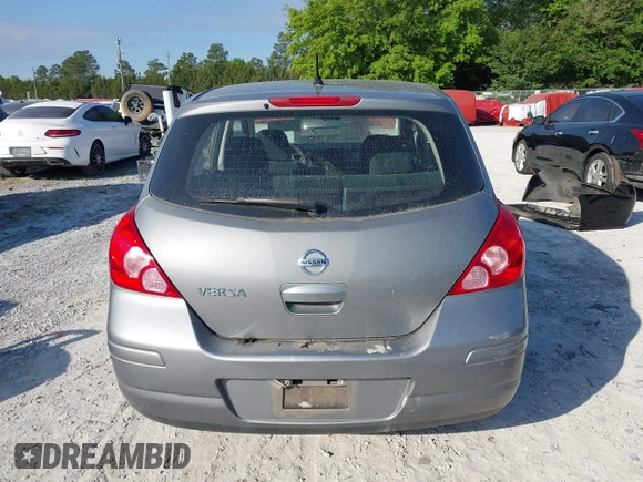 2012 Nissan Versa S with VIN 3N1BC1CP8CK242212, listed as a IAAI auction lot 42027327 with 117,118 mi miles. Bid and sale history available at carsss.com. Image 16.