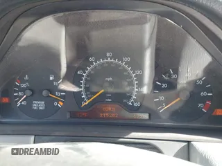 1997 Mercedes-Benz E-Class with VIN WDBJF55F6VJ032691, listed as a IAAI auction lot 40807926 with 215,262 mi miles. Bid and sale history available at carsss.com. Image 7.