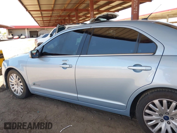 2010 Ford Fusion Hybrid with VIN 3FADP0L32AR143350, listed as a IAAI auction lot 42549839 with 137,466 mi miles and . Bid and sale history available at DreamBid. Image 14.