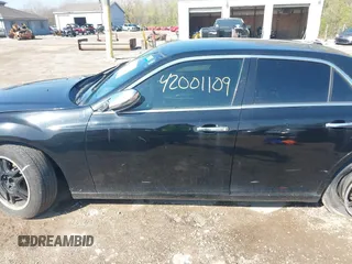 2014 Chrysler 300 C with VIN 2C3CCAKG5EH179583, listed as a IAAI auction lot 42001109 with 148,288 mi miles and . Bid and sale history available at carsss.com. Image 14.