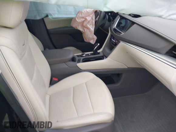 2021 Cadillac XT5 FWD Premium Luxury with VIN 1GYKNCRS2MZ185678, listed as a IAAI auction lot 41143084 with 25,399 mi miles and . Bid and sale history available at carsss.com. Image 5.