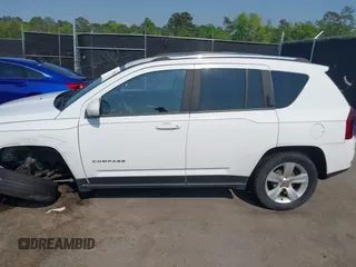 2014 Jeep Compass Latitude with VIN 1C4NJCEB7ED794428, listed as a IAAI auction lot 41995264 with 182,413 mi miles. Bid and sale history available at carsss.com. Image 15.