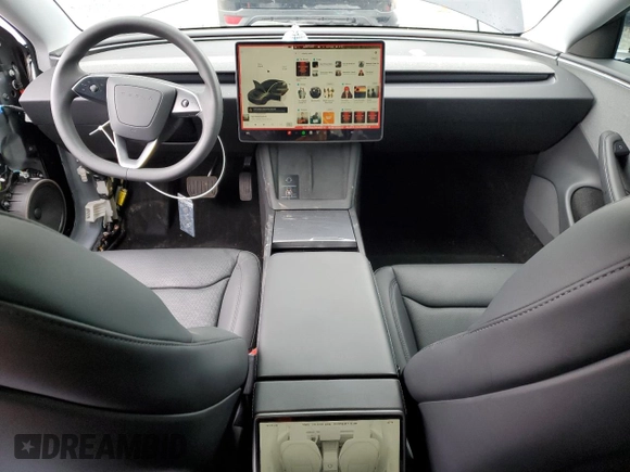 2025 Tesla Model 3 Long Range with VIN 5YJ3E1EA5SF889727, listed as a Copart auction lot 49207545 with 6,980 mi miles and Salvage Title. Bid and sale history available at carsss.com. Image 8.