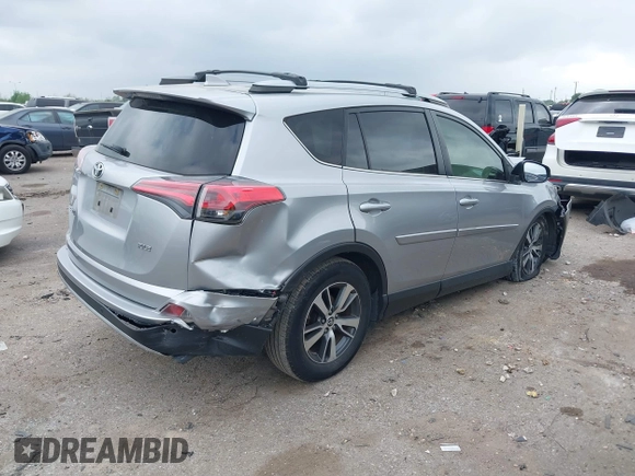 2018 Toyota RAV4 XLE with VIN JTMWFREV7JJ203609, listed as a IAAI auction lot 41938100 with 51,021 mi miles. Bid and sale history available at carsss.com. Image 4.