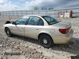 2001 Saturn SL z VIN 1G8ZK52741Z200069, wystawiony jako Copart lot #56360685 z przebiegiem 115 673 mil mil oraz Nie do naprawy. Historia ofert i sprzedaży dostępna na DreamBid. Obrazek 2.