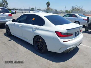 2019 BMW 3 Series 330i with VIN WBA5R1C55KAJ98934, listed as a IAAI auction lot 42396379 with 65,946 mi miles and . Bid and sale history available at DreamBid. Image 3.