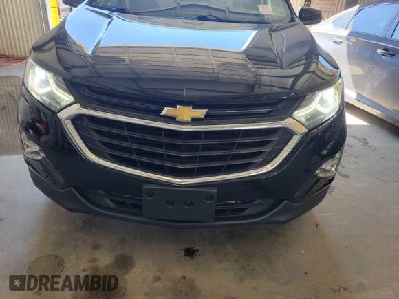 2020 Chevrolet Equinox LT z VIN 2GNAXJEV5L6233921, wystawiony jako IAAI lot #42466454 z przebiegiem 64 667 mil mil oraz . Historia ofert i sprzedaży dostępna na DreamBid. Obrazek 8.
