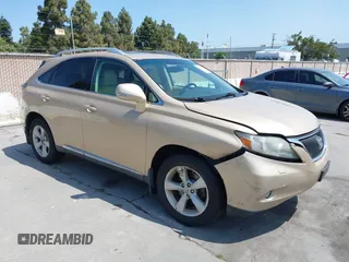 2010 Lexus RX 350 with VIN 2T2BK1BA1AC001854, listed as a IAAI auction lot 42574771 with 240,115 mi miles and . Bid and sale history available at DreamBid. Image 1.
