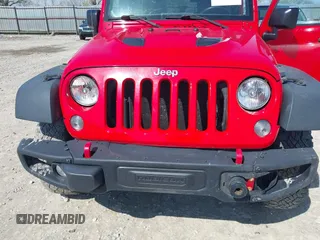 2015 Jeep Wrangler Unlimited Rubicon Hard Rock with VIN 1C4HJWFG9FL525556, listed as a IAAI auction lot 41973576 with 246,949 mi miles and . Bid and sale history available at DreamBid. Image 6.