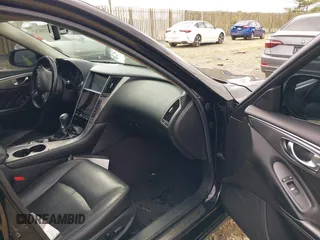 2015 Infiniti Q50 z VIN JN1BV7AR2FM421111, wystawiony jako IAAI lot #42209282 z przebiegiem 128 481 mil mil oraz . Historia ofert i sprzedaży dostępna na DreamBid. Obrazek 5.