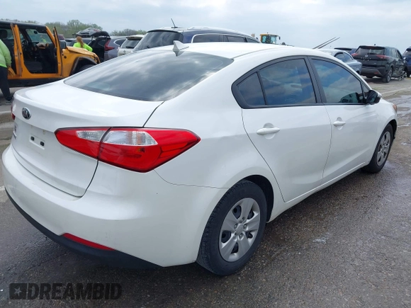 2015 Kia Forte LX with VIN KNAFX4A69F5421840, listed as a IAAI auction lot 42019236 with 147,847 mi miles. Bid and sale history available at carsss.com. Image 4.