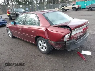 1999 Cadillac Catera z VIN W06VR52R0XR144059, wystawiony jako IAAI lot #41921629 z przebiegiem 80 937 mil mil oraz . Historia ofert i sprzedaży dostępna na DreamBid. Obrazek 3.