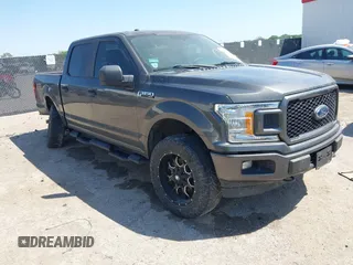 2018 Ford F-150 XL with VIN 1FTEW1EP2JKC08323, listed as a IAAI auction lot 42028943 with 60,692 mi miles and . Bid and sale history available at DreamBid. Image 1.