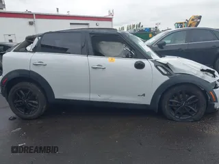 2011 MINI Countryman S z VIN WMWZC5C54BWM10154, wystawiony jako IAAI lot #37722183 z przebiegiem Nie podano mil oraz . Historia ofert i sprzedaży dostępna na DreamBid. Obrazek 12.