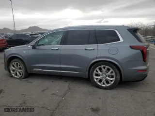 2020 Cadillac XT6 FWD Premium Luxury with VIN 1GYKPCRS5LZ201302, listed as a Copart auction lot 47898165 with 61,527 mi miles and Salvage Title. Bid and sale history available at carsss.com. Image 2.