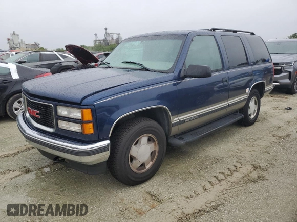 1999 GMC Yukon with VIN 1GKEK13R2XJ739931, listed as a Copart auction lot 74583734 with 115,605 mi miles and Salvage Title. Bid and sale history available at carsss.com. Image 1.